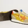Marathon para hombre con parte superior de nailon amarillo y estrella naranja Marathon para hombre con parte superior de nailon amarillo y estrella naranja