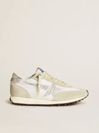 Marathon para hombre con parte superior de nailon blanco y estrella plateada.