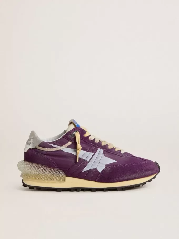 Marathon para hombre con parte superior de nailon morado y estrella blanca. Marathon para hombre con parte superior de nailon morado y estrella blanca.