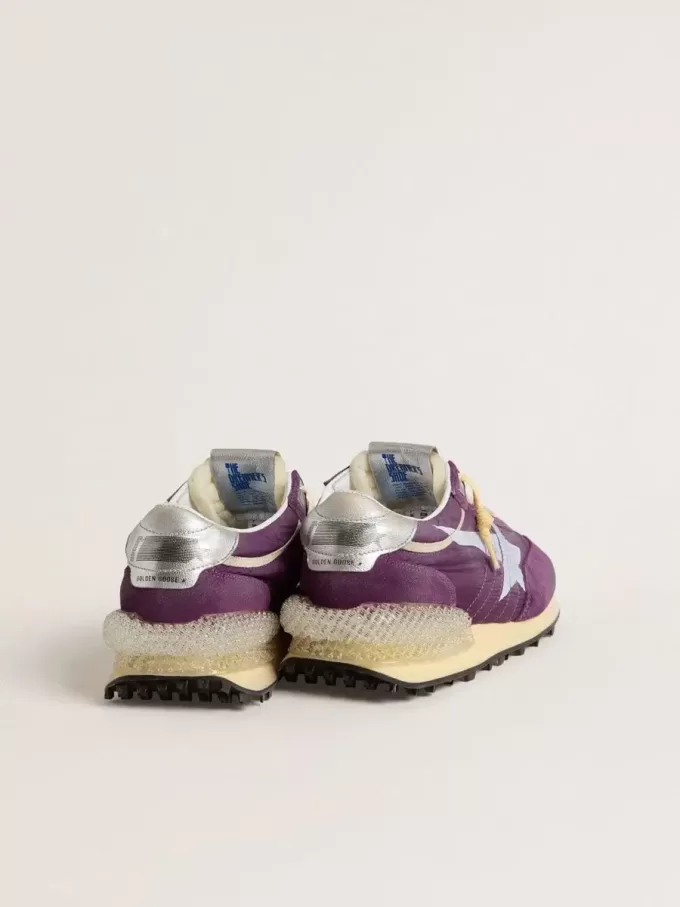 Marathon para hombre con parte superior de nailon morado y estrella blanca. Marathon para hombre con parte superior de nailon morado y estrella blanca.
