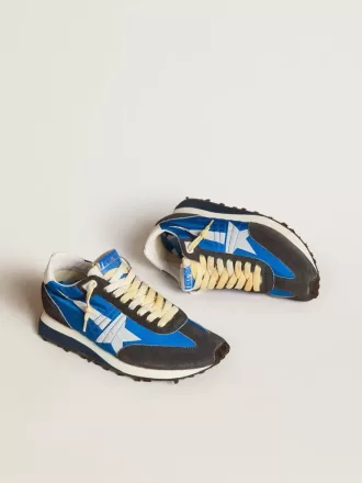 Marathon para mujer con parte superior de nailon azul y estrella blanca