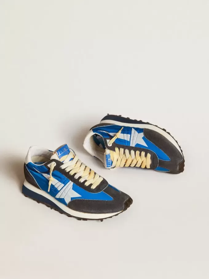 Marathon para mujer con parte superior de nailon azul y estrella blanca Marathon para mujer con parte superior de nailon azul y estrella blanca