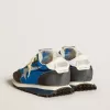 Marathon para mujer con parte superior de nailon azul y estrella blanca Marathon para mujer con parte superior de nailon azul y estrella blanca