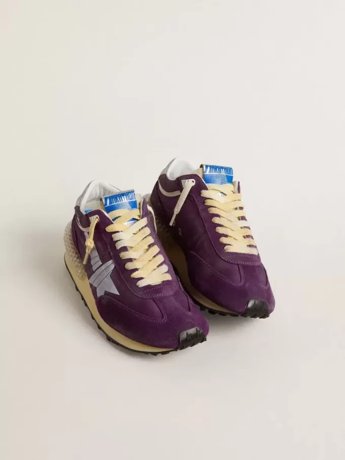 Maratón para mujer con parte superior de nailon morado y estrella blanca Maratón para mujer con parte superior de nailon morado y estrella blanca