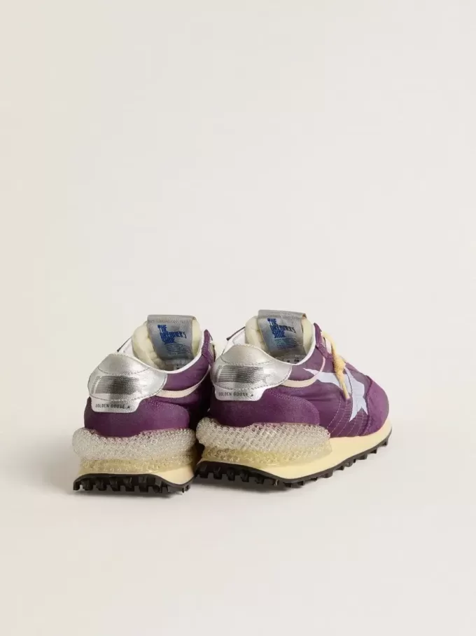 Maratón para mujer con parte superior de nailon morado y estrella blanca Maratón para mujer con parte superior de nailon morado y estrella blanca