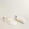 Matchstar en piel blanca brillante con lengüeta del talón en piel roja brillante Matchstar en piel blanca brillante con lengüeta del talón en piel roja brillante