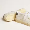 Matchstar para mujer en piel blanca con lengüeta del talón en piel azul oscuro