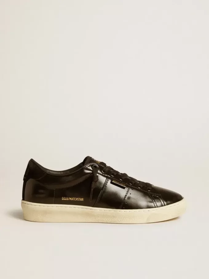 Matchstar para mujer en piel negra con lengüeta del talón en ante negro