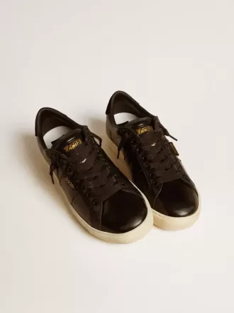 Matchstar para mujer en piel negra con lengüeta del talón en ante negro