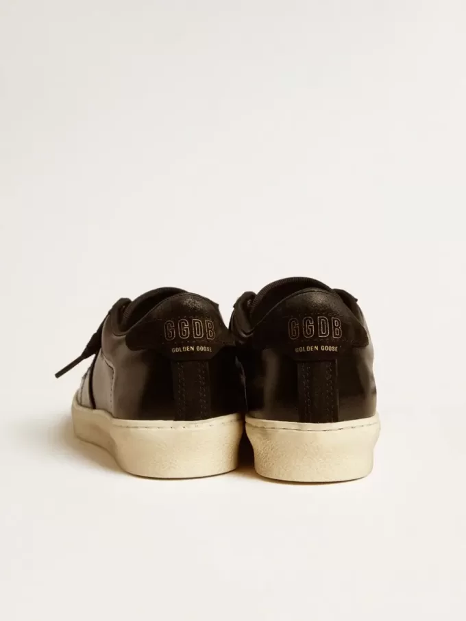 Matchstar para mujer en piel negra con lengüeta del talón en ante negro