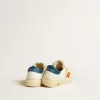 May Teen en nubuck con estrella naranja y lengüeta azul en el talón