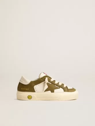 May Young en cuero blanco y verde militar
