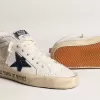 Mid Star con estrella azul brillante y lengüeta de ante rosa en el talón.
