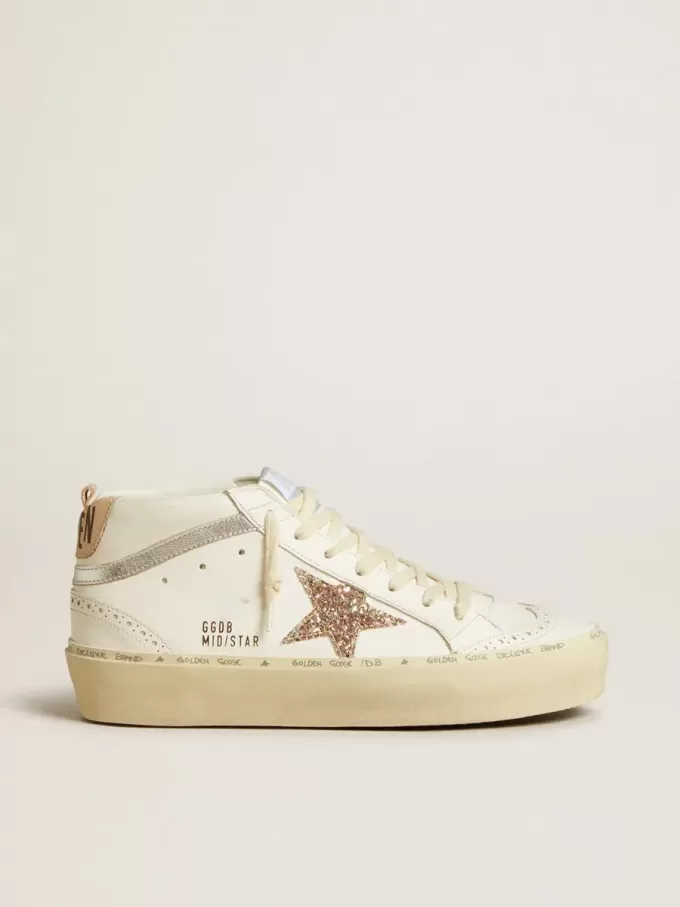 Mid Star con estrella brillante y detalle metálico plateado en piel Mid Star con estrella brillante y detalle metálico plateado en piel