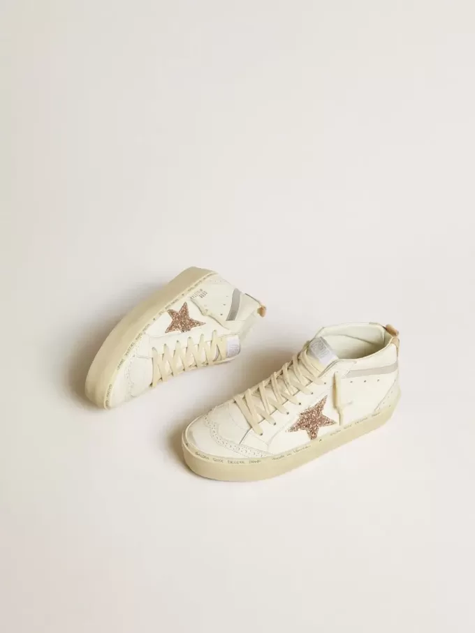 Mid Star con estrella brillante y detalle metálico plateado en piel Mid Star con estrella brillante y detalle metálico plateado en piel