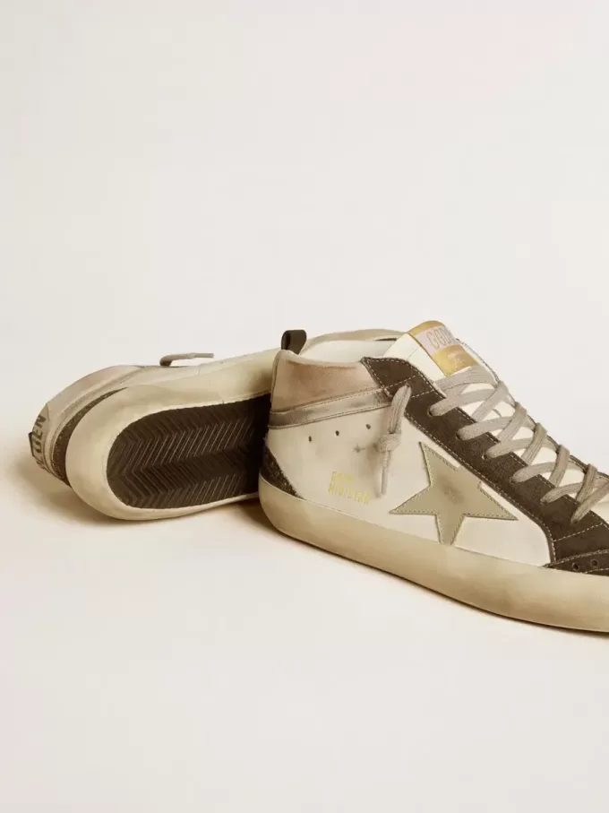 Mid Star con estrella de cuero gris y detalle metálico plateado en cuero Mid Star con estrella de cuero gris y detalle metálico plateado en cuero