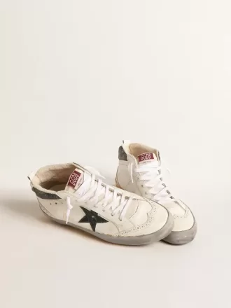 Mid Star con estrella de piel metalizada verde y destello blanco