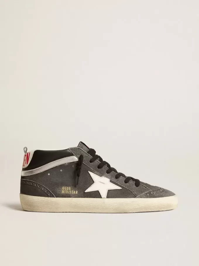 Mid Star en ante negro con estrella de cuero blanco y detalle plateado Mid Star en ante negro con estrella de cuero blanco y detalle plateado