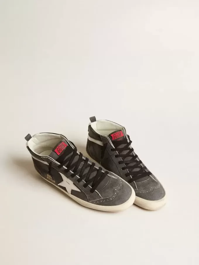 Mid Star en ante negro con estrella de cuero blanco y detalle plateado Mid Star en ante negro con estrella de cuero blanco y detalle plateado