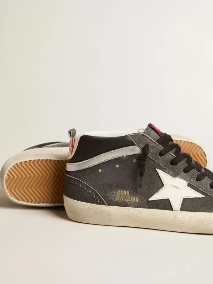Mid Star en ante negro con estrella de cuero blanco y detalle plateado Mid Star en ante negro con estrella de cuero blanco y detalle plateado