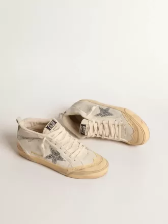 Mid Star LTD con estrella brillante y detalle metálico en el ante