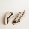 Mid Star LTD para hombre en piel negra y blanca con perlas y estrella perforada Mid Star LTD para hombre en piel negra y blanca con perlas y estrella perforada