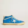 Mid Star para hombre en ante con estrella de piel metalizada y lengüeta de piel en el talón. Mid Star para hombre en ante con estrella de piel metalizada y lengüeta de piel en el talón.