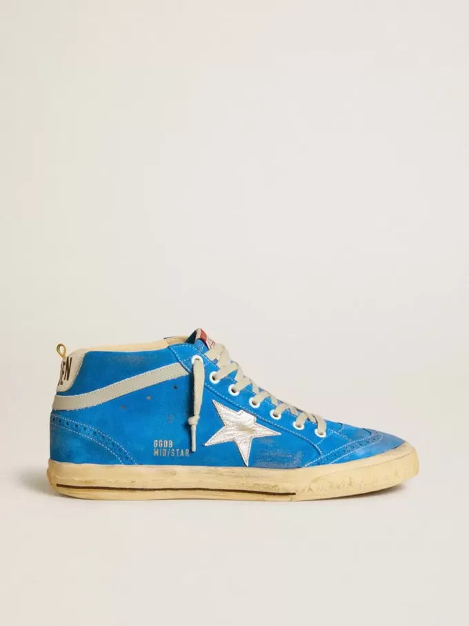 Mid Star para hombre en ante con estrella de piel metalizada y lengüeta de piel en el talón. Mid Star para hombre en ante con estrella de piel metalizada y lengüeta de piel en el talón.