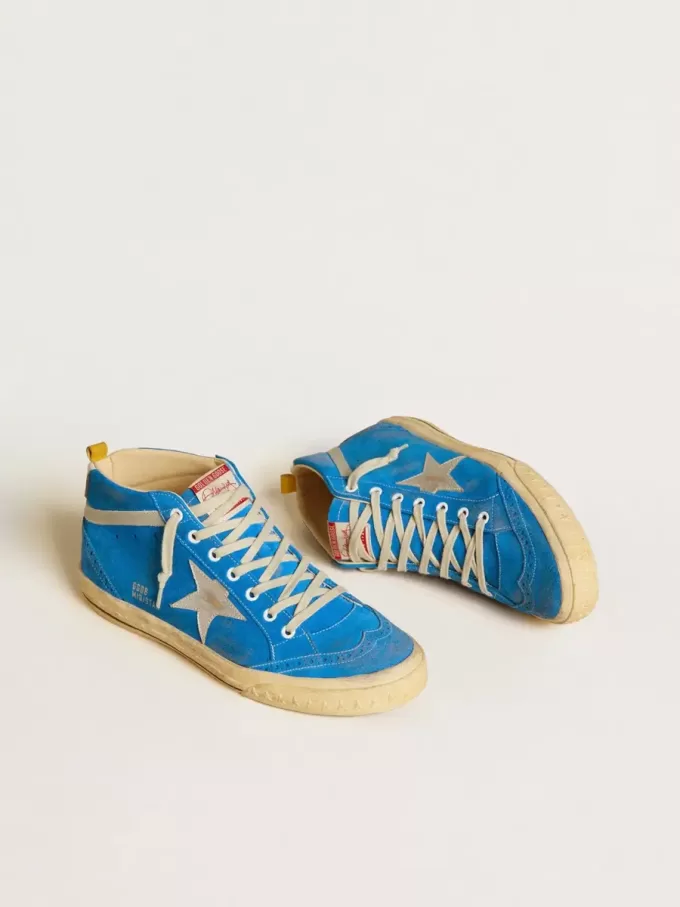 Mid Star para hombre en ante con estrella de piel metalizada y lengüeta de piel en el talón. Mid Star para hombre en ante con estrella de piel metalizada y lengüeta de piel en el talón.