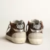 Mid Star para mujer en piel de potro con estampado de leopardo y estrella negra Mid Star para mujer en piel de potro con estampado de leopardo y estrella negra