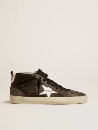 Mid Star para mujer en piel negra con estrella de piel metalizada plateada Mid Star para mujer en piel negra con estrella de piel metalizada plateada
