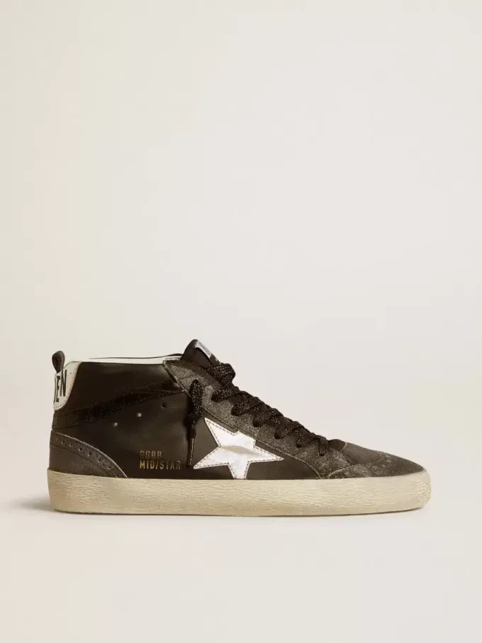 Mid Star para mujer en piel negra con estrella de piel metalizada plateada Mid Star para mujer en piel negra con estrella de piel metalizada plateada
