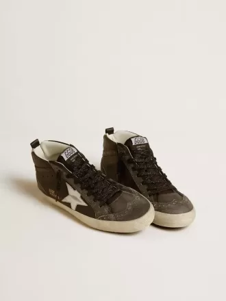 Mid Star para mujer en piel negra con estrella de piel metalizada plateada Mid Star para mujer en piel negra con estrella de piel metalizada plateada