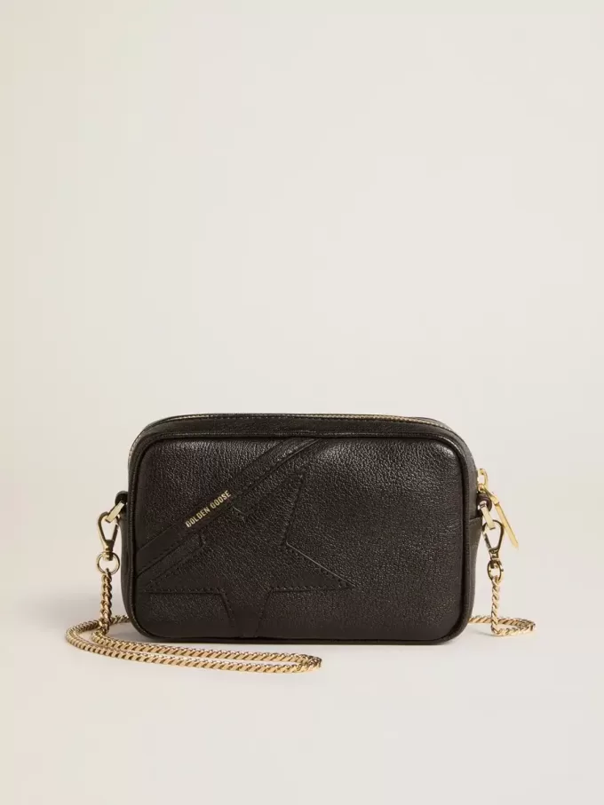 Mini bolso Star en piel negra con estrella tono sobre tono Mini bolso Star en piel negra con estrella tono sobre tono