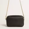 Mini bolso Star en piel negra con estrella tono sobre tono Mini bolso Star en piel negra con estrella tono sobre tono