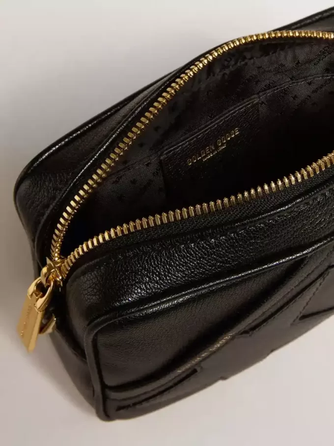 Mini bolso Star en piel negra con estrella tono sobre tono Mini bolso Star en piel negra con estrella tono sobre tono