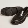 Mocasines gruesos para mujer en piel negra con tachuelas