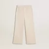 Pantalones anchos de canalé color crema con bordados para niña Pantalones anchos de canalé color crema con bordados para niña