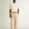 Pantalones chinos beige para hombre con acabado desgastado Pantalones chinos beige para hombre con acabado desgastado