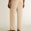 Pantalones chinos beige para hombre con acabado desgastado Pantalones chinos beige para hombre con acabado desgastado