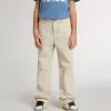 Pantalones chinos beige para niño con salpicaduras multicolores Pantalones chinos beige para niño con salpicaduras multicolores