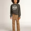 Pantalones chinos para niño en algodón color caramelo. Pantalones chinos para niño en algodón color caramelo.