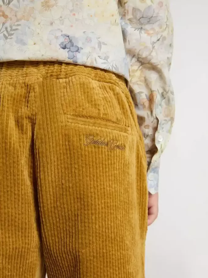 Pantalones chinos para niño en color tabaco con bordados Pantalones chinos para niño en color tabaco con bordados