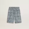 Pantalones cortos azules para niño con estampado blanco Pantalones cortos azules para niño con estampado blanco