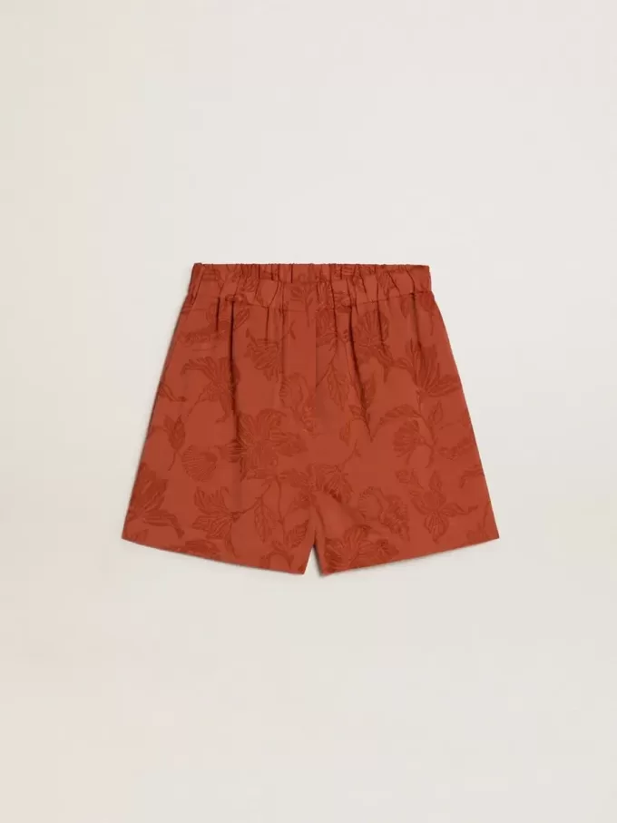Pantalones cortos de mujer en jacquard rojo ladrillo con estampado floral marino