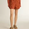 Pantalones cortos de mujer en jacquard rojo ladrillo con estampado floral marino