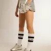 Pantalones cortos de running para mujer en tejido plateado Pantalones cortos de running para mujer en tejido plateado