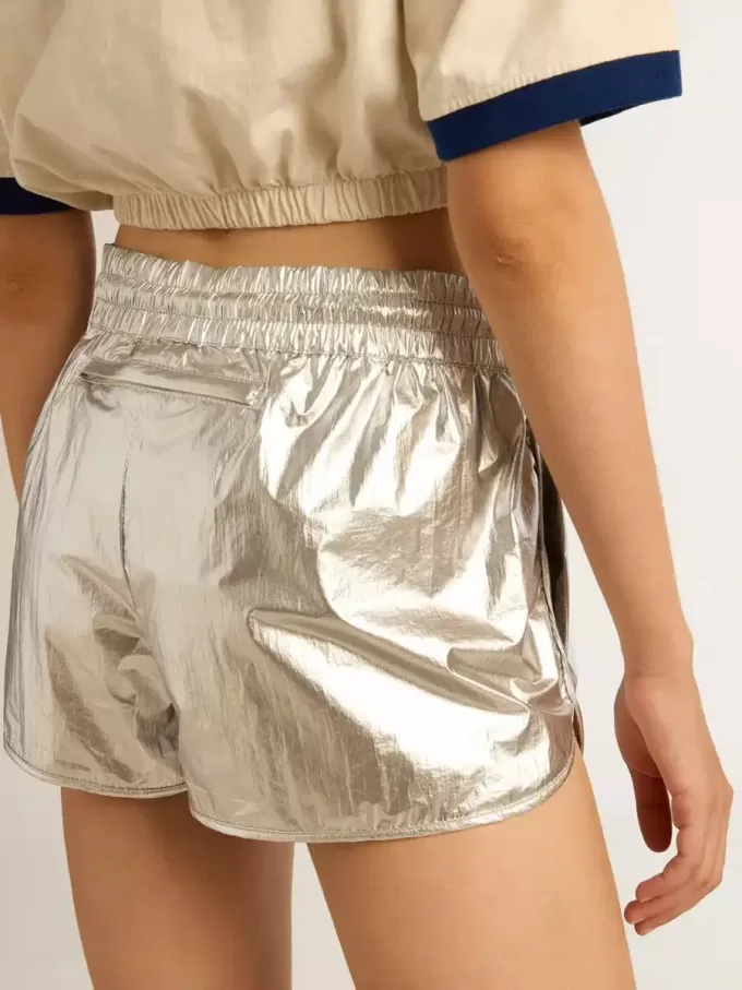 Pantalones cortos de running para mujer en tejido plateado Pantalones cortos de running para mujer en tejido plateado