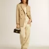Pantalones crudo con lentejuelas transparentes por toda la prenda Pantalones crudo con lentejuelas transparentes por toda la prenda