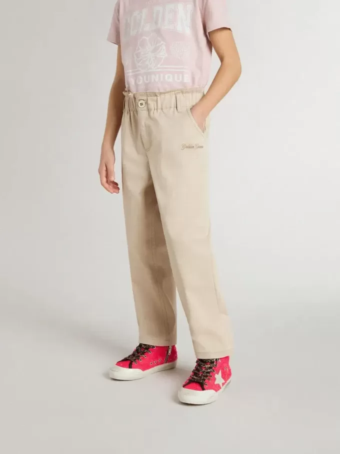 Pantalones de algodón beige con bordado para niña Pantalones de algodón beige con bordado para niña